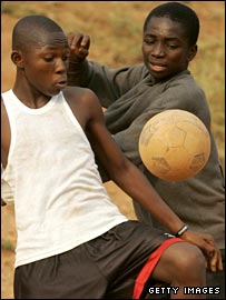 Children Playing Football In Africa