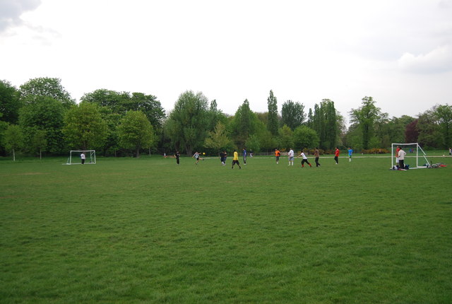 Children Playing Football In The Park