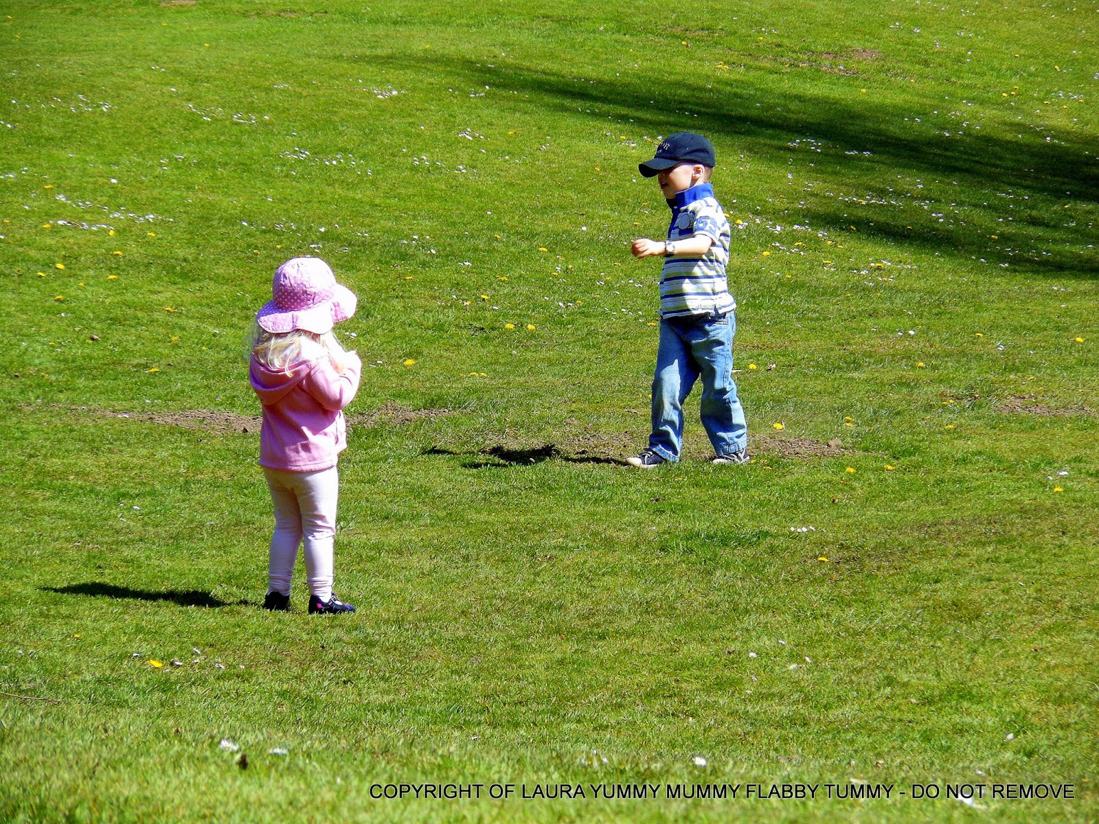 Children Playing Football In The Park