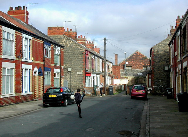 Children Playing Football In The Street