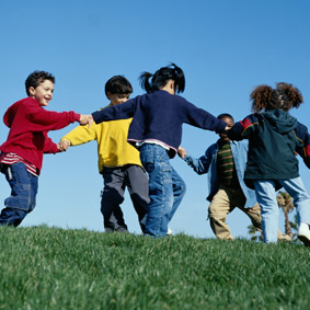 Young Children Playing Outside